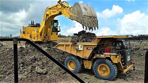 mini excavator loading dump truck|large diggers loading trucks.